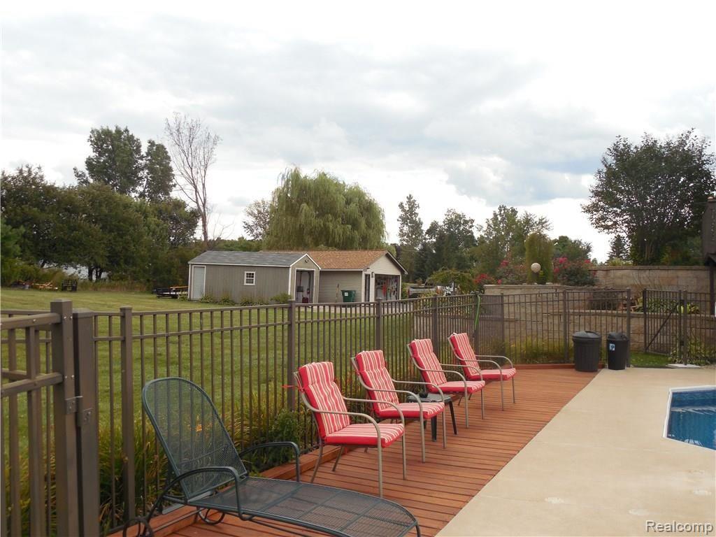 3955 Innisfree Road Howell, MI 48855 - Photo 25 of 43 More yard space and out buildings for more storage for your toys.