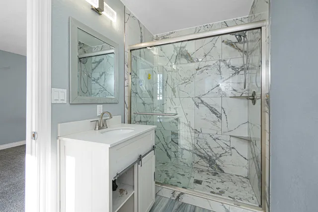 a view of a house with a swimming pool and a big yard