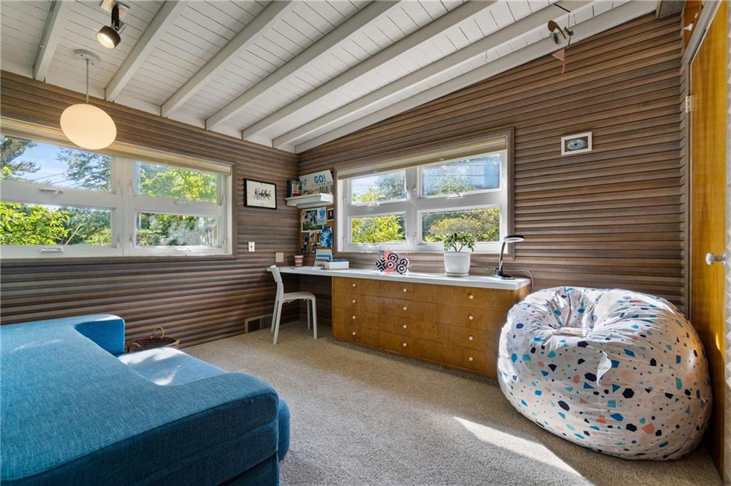 17 Penhurst Road Pittsburgh, PA 15202 - Photo 24 of 42 a living room with a large window and chandelier