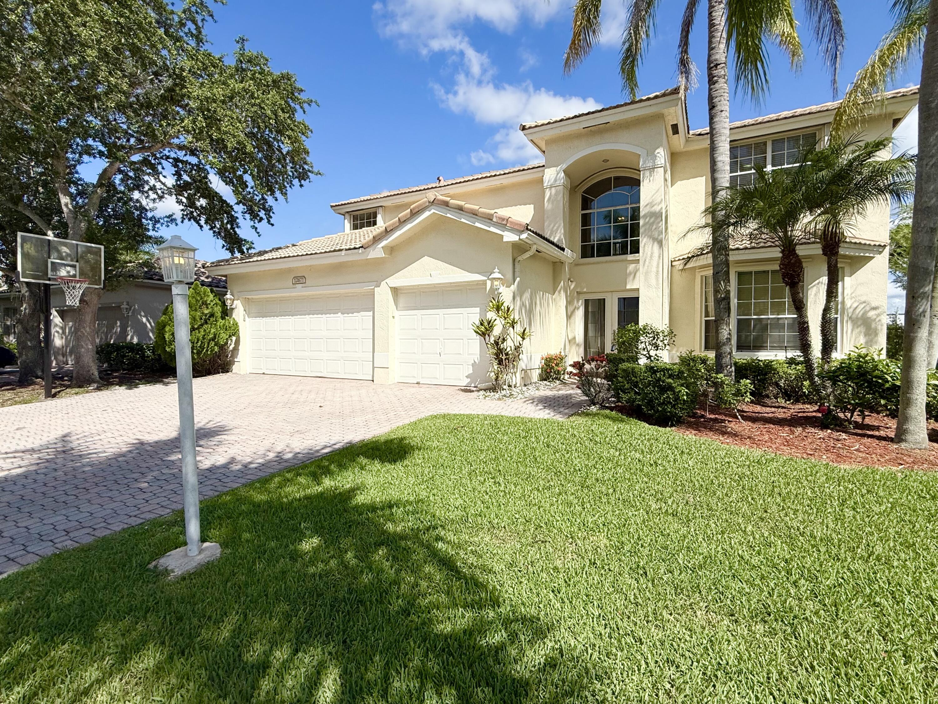 12671 Yardley Drive Boca Raton, FL 33428 - Photo 26 of 36 Front Elevation