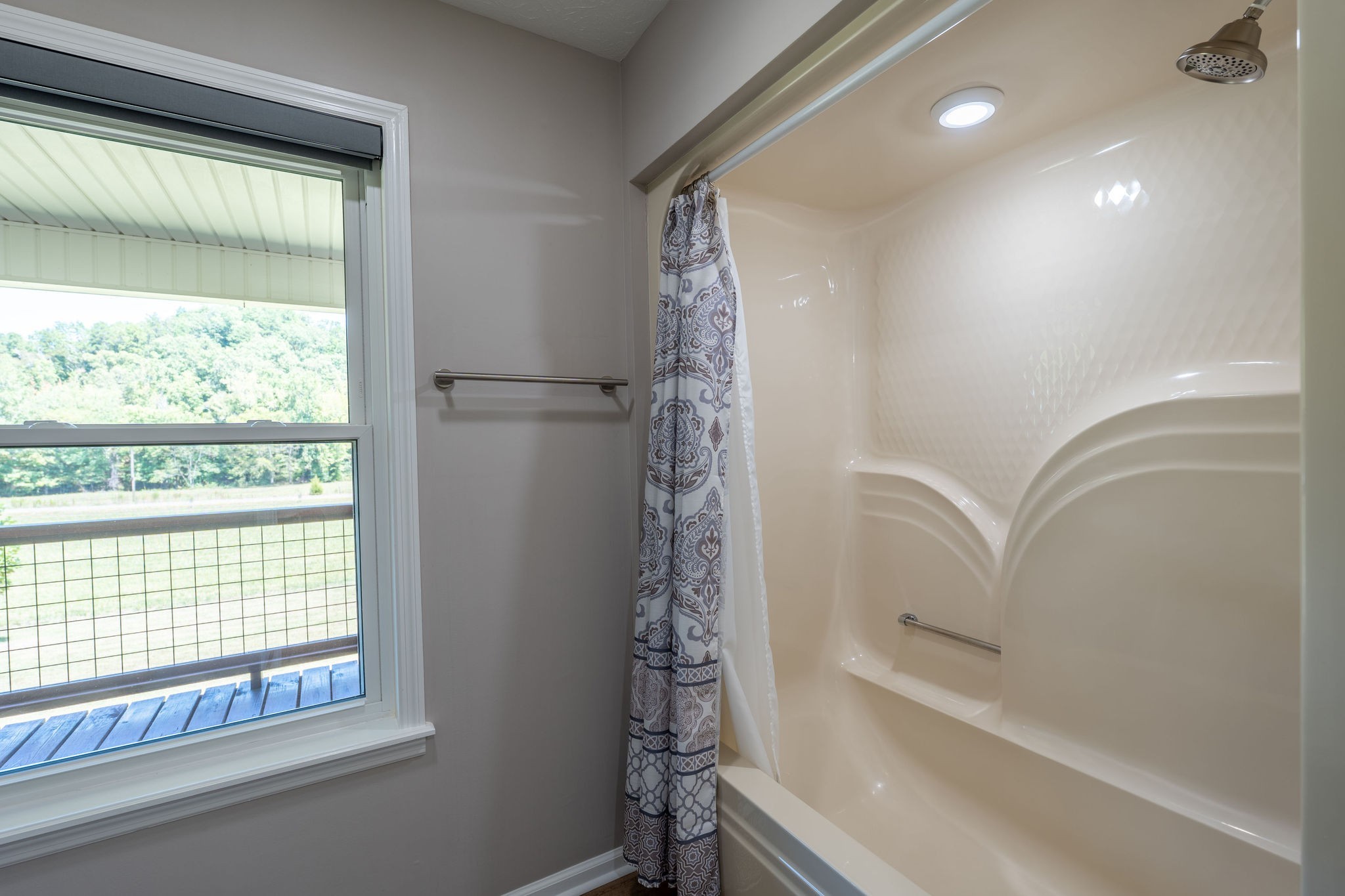 6285 Rayburn Creek Road Collinwood, TN 38450 - Photo 18 of 51 a bathroom with a shower