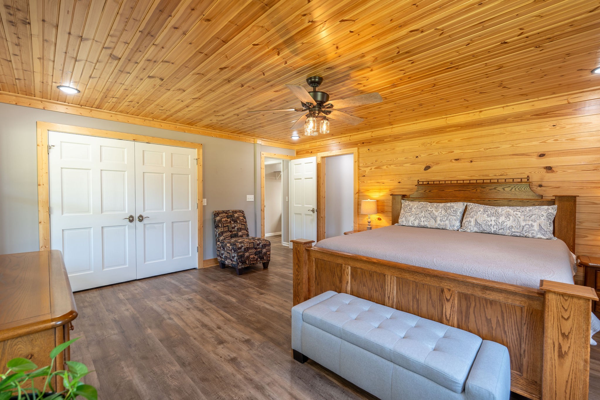 6285 Rayburn Creek Road Collinwood, TN 38450 - Photo 20 of 51 a bedroom with a bed and wooden floor