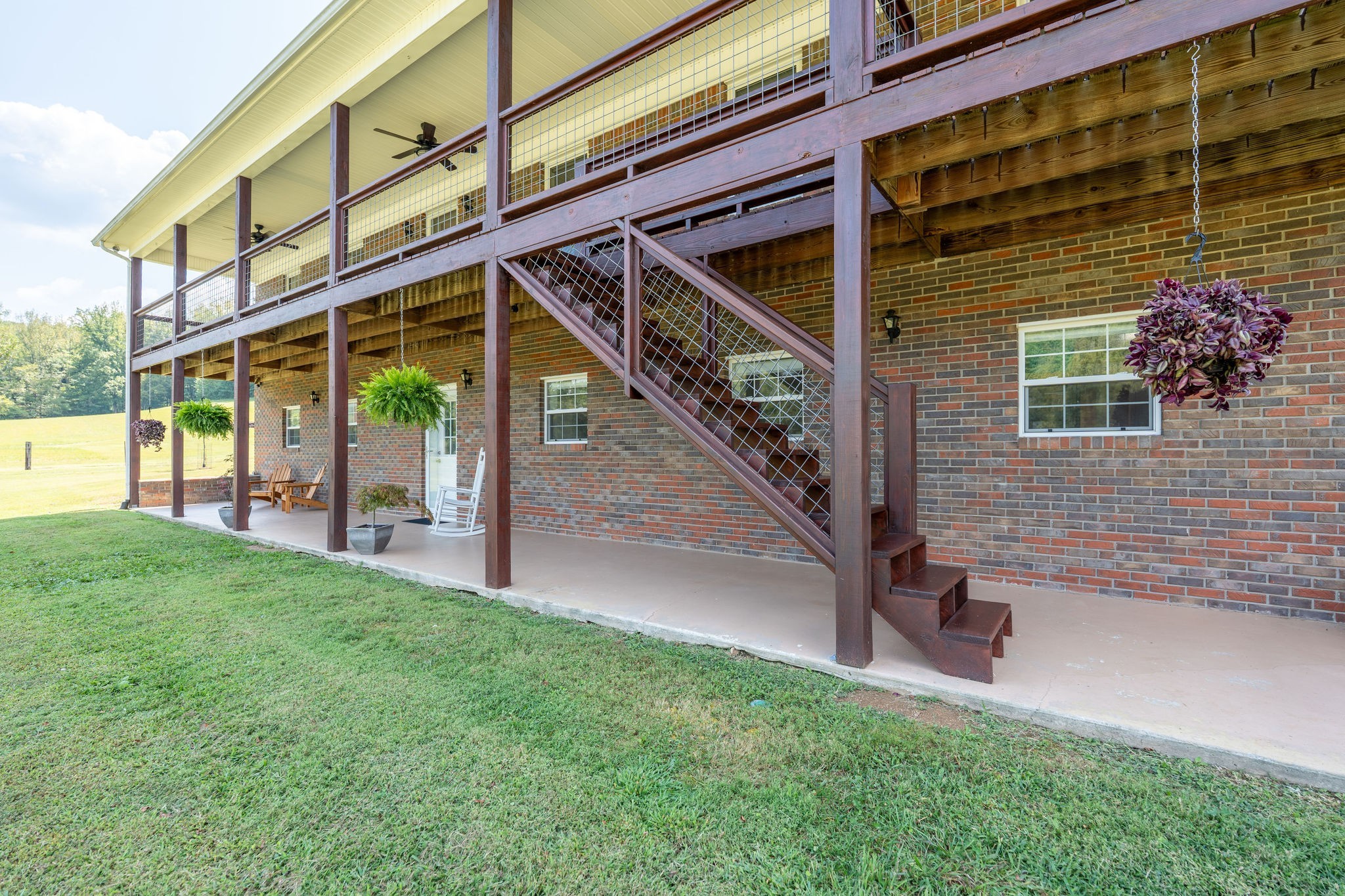 6285 Rayburn Creek Road Collinwood, TN 38450 - Photo 2 of 51 a view of backyard with deck and outdoor seating
