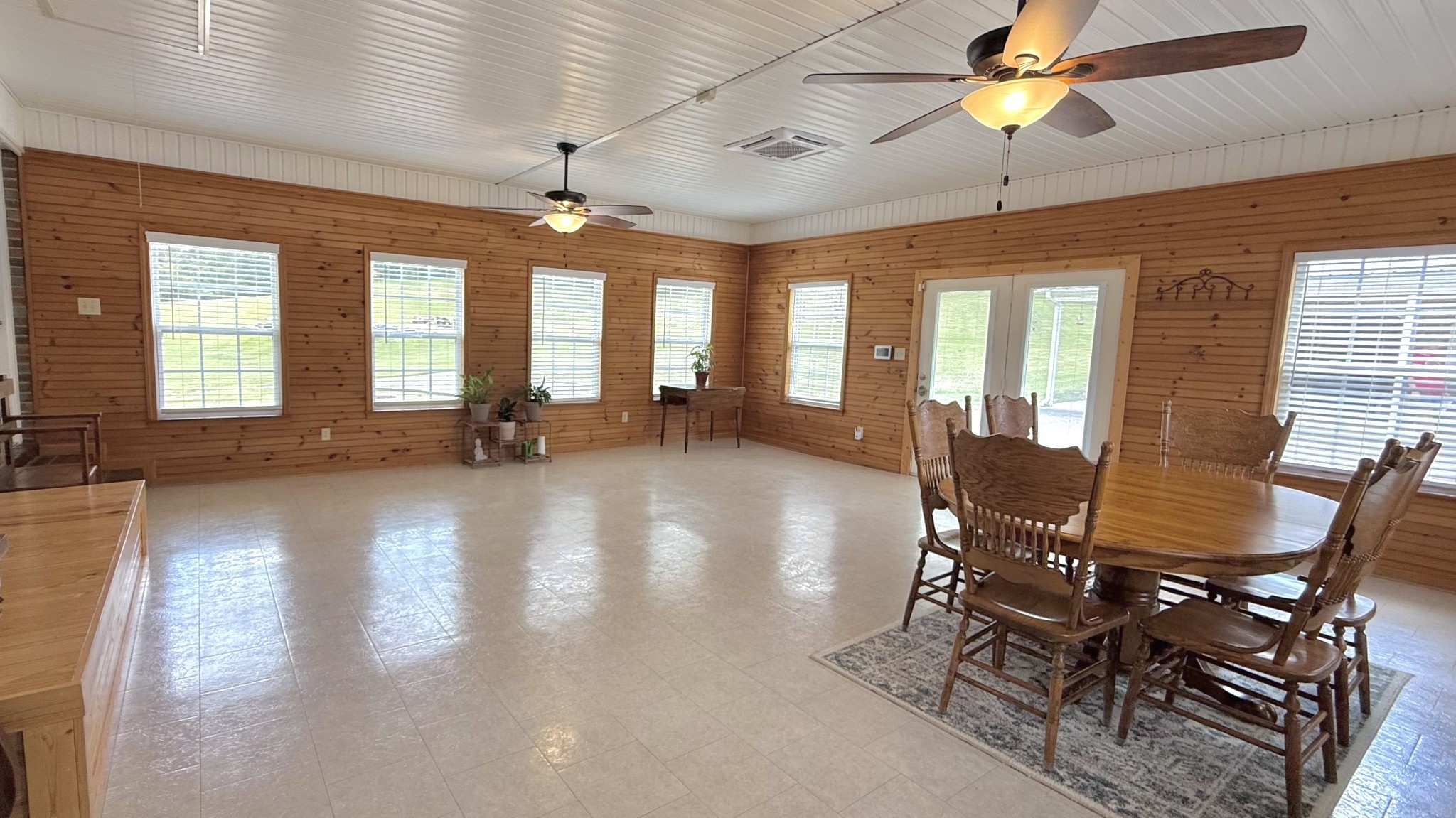 6285 Rayburn Creek Road Collinwood, TN 38450 - Photo 28 of 51 a view of a dining room with furniture window and wooden floor
