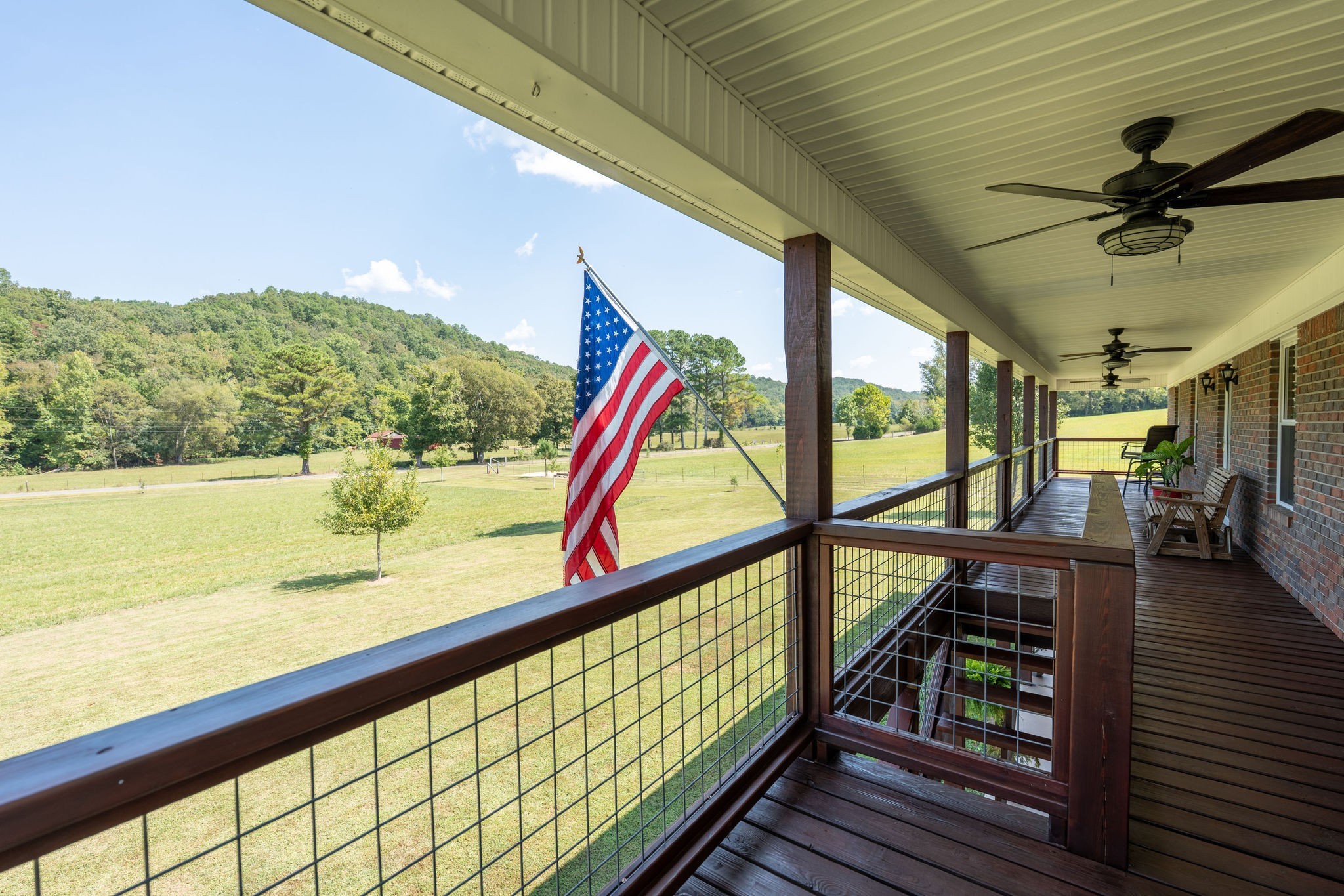6285 Rayburn Creek Road Collinwood, TN 38450 - Photo 3 of 51 a view of a balcony with furniture