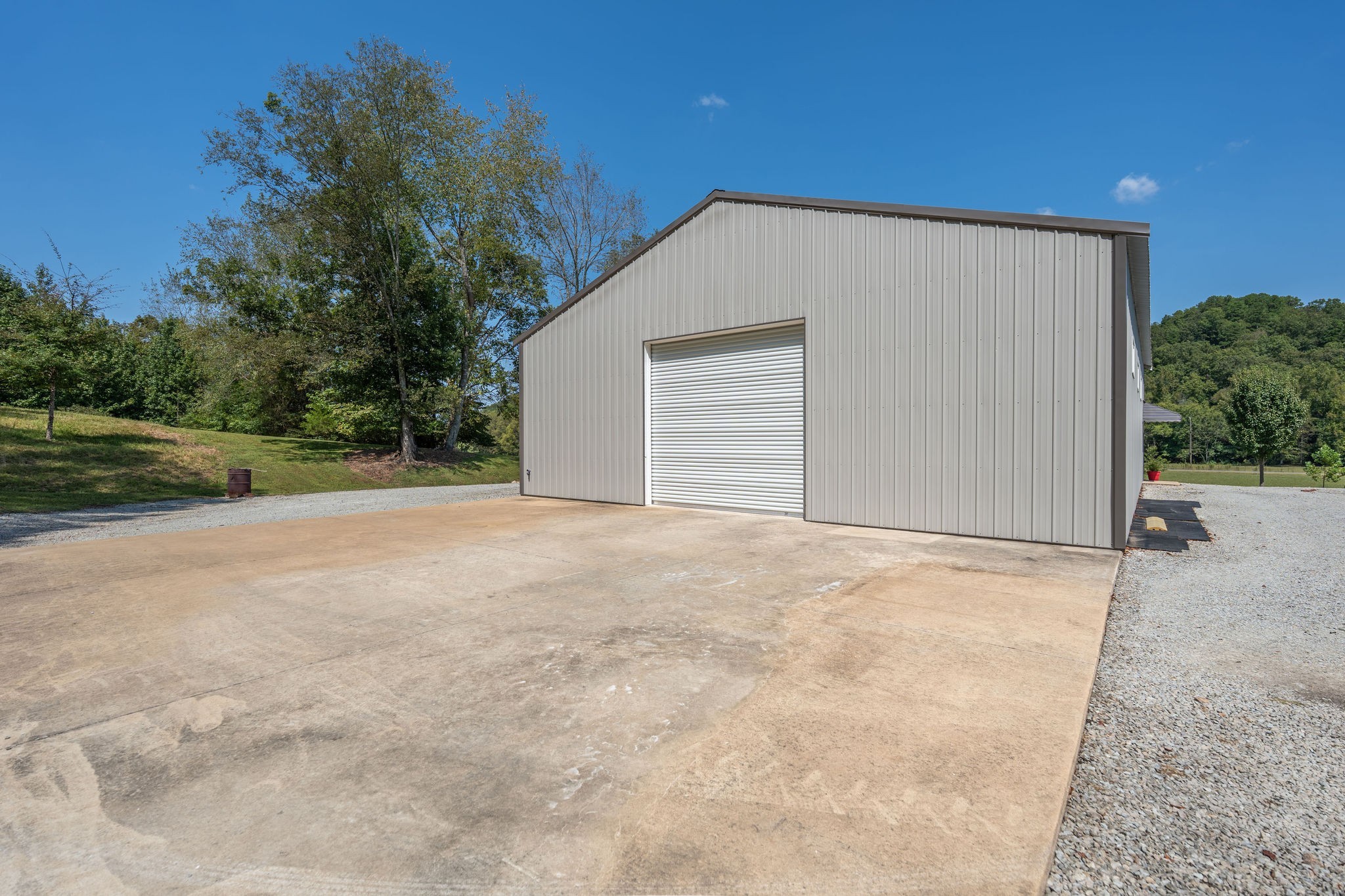 6285 Rayburn Creek Road Collinwood, TN 38450 - Photo 37 of 51 a view of a garage with a backyard