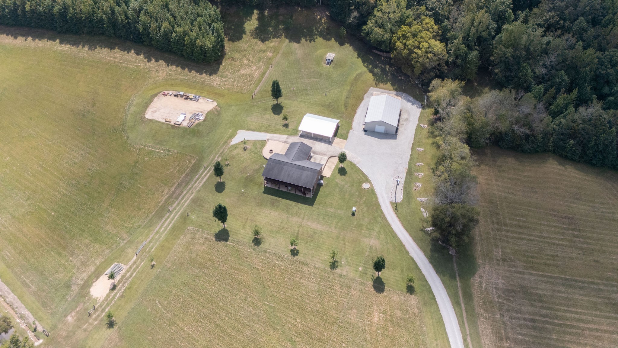 6285 Rayburn Creek Road Collinwood, TN 38450 - Photo 49 of 51 an aerial view of a house with outdoor space and lake view