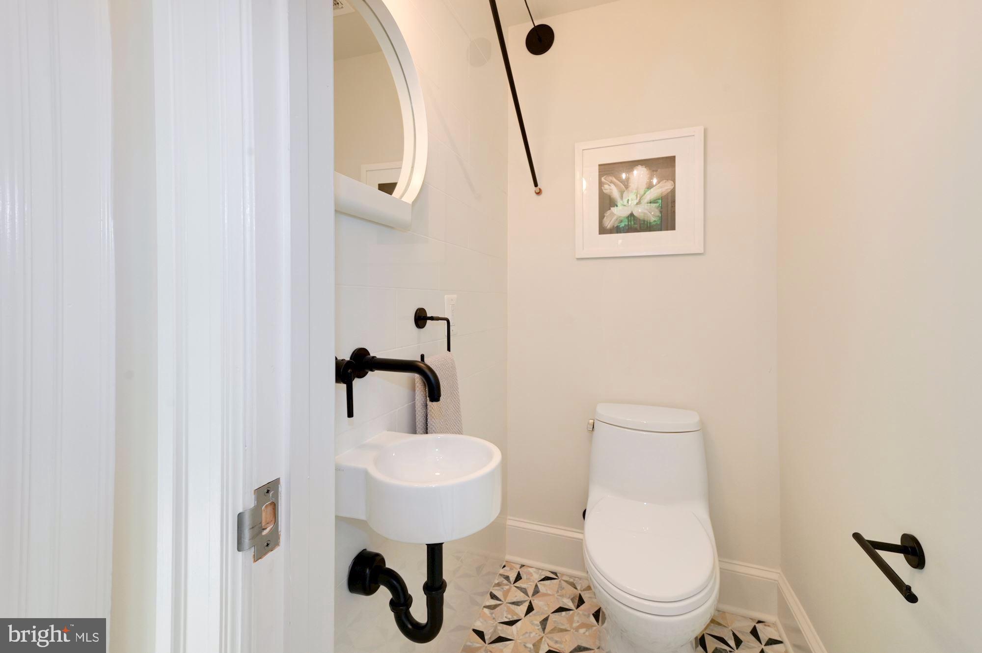3102 Rodman Street Northwest Washington, DC 20008 - Photo 17 of 40 Main Floor Powder Room