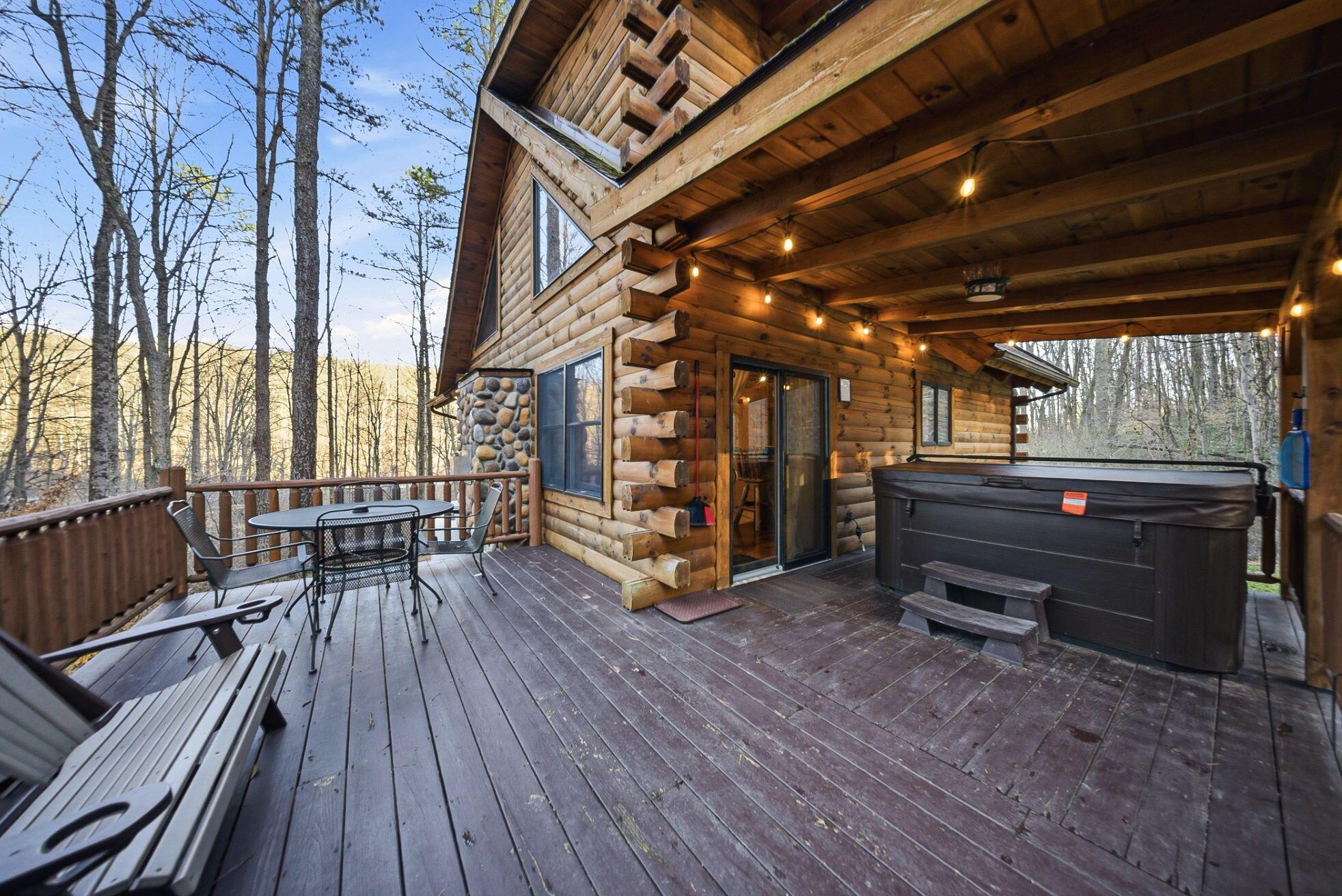 15399 Clapper Hollow Road Laurelville, OH 43135 - Photo 6 of 61 Back Deck with Hot Tub, Gas Grill, and Marked Hiking Trails to the Fire Pit and Pond