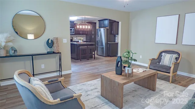 a kitchen with a table chairs and a wooden cabinets