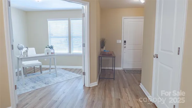 a work room with furniture and a window