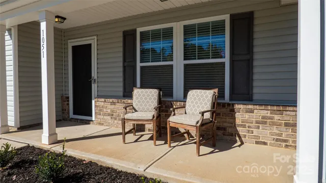a building outdoor space with patio furniture