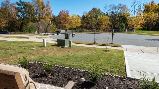 a view of a yard with an trees