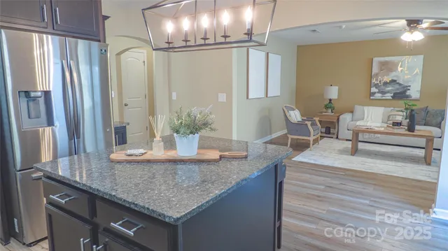 a kitchen with cabinets a sink and appliances