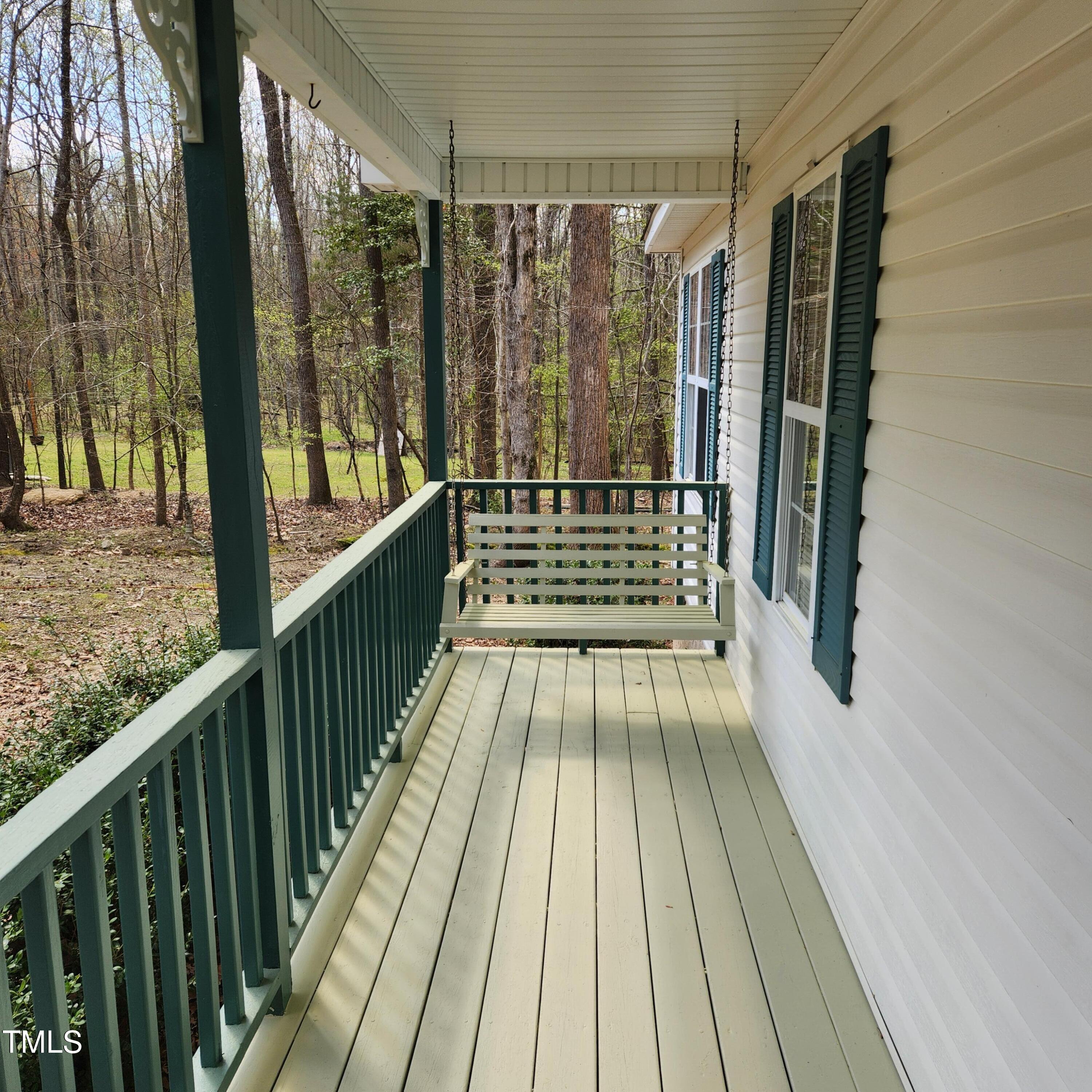 132 Waiters Way Youngsville, NC 27596 - Photo 14 of 30 a view of balcony with wooden floor