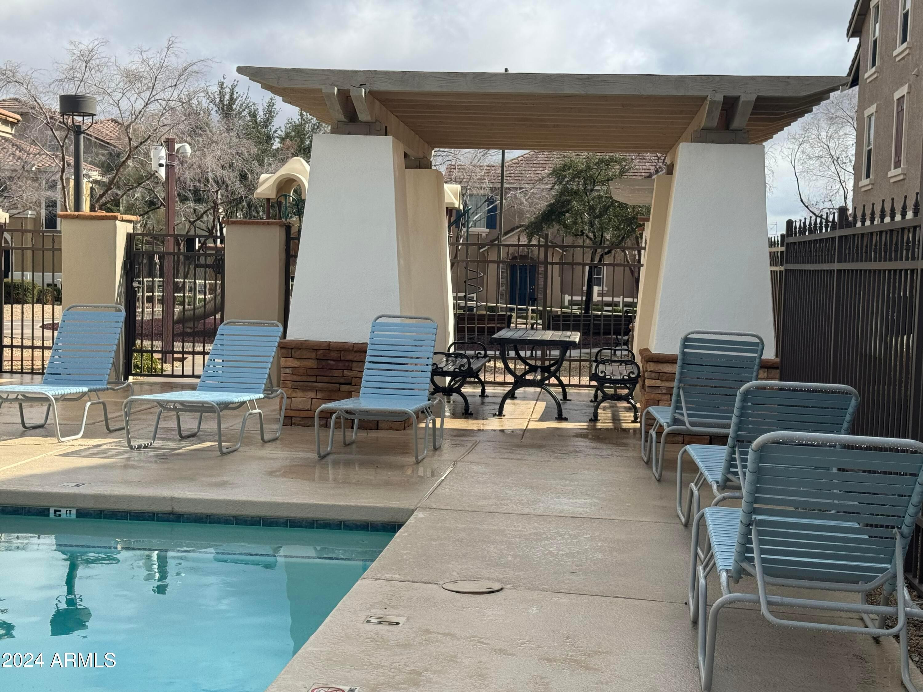 446 North Alder Court Gilbert, AZ 85233 - Photo 11 of 25 a view of dinning table and chairs in the patio
