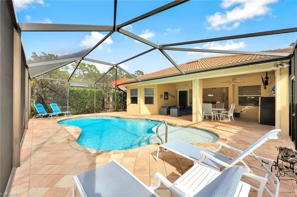 a view of a house with swimming pool