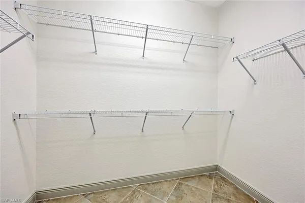 a view of a room with racks on the wall