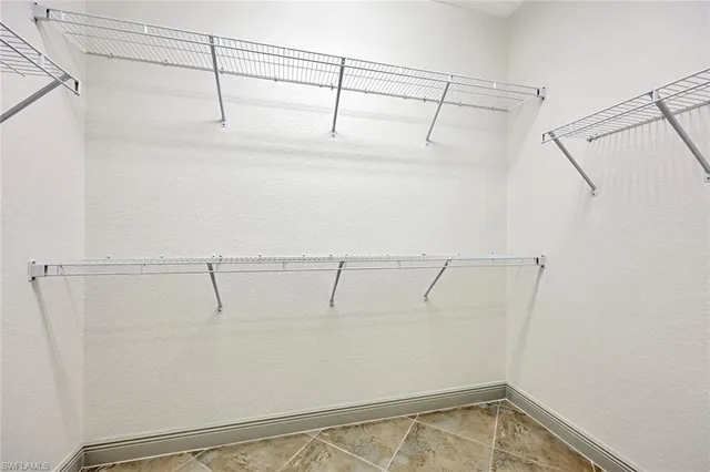 a view of a room with racks on the wall