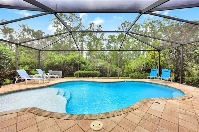 a view of a swimming pool with a porch