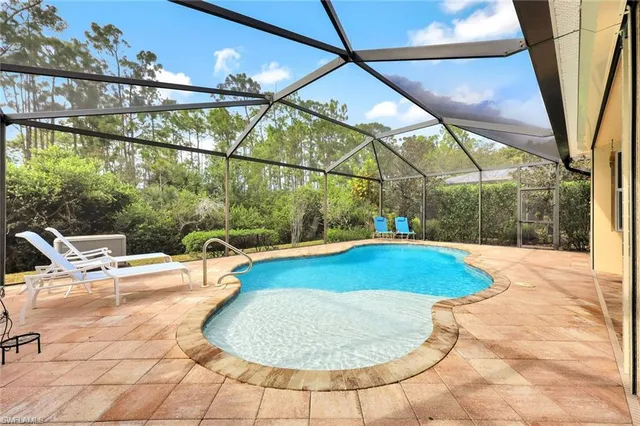 a view of outdoor space with swimming pool