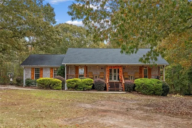 front view of a house with a yard