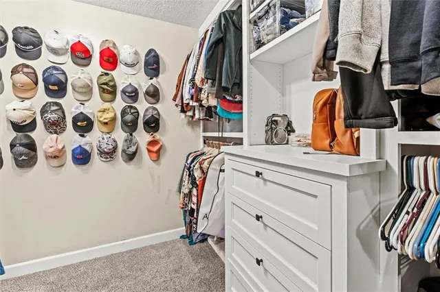 a bedroom with a bed and furniture