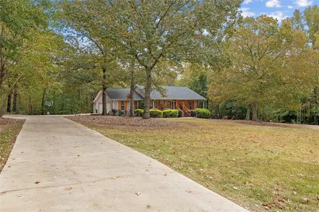 a house with trees in front of it