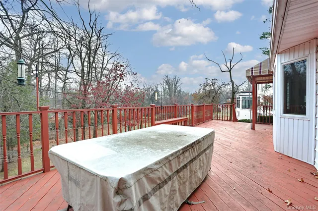a view of a dinning table and chairs in patio