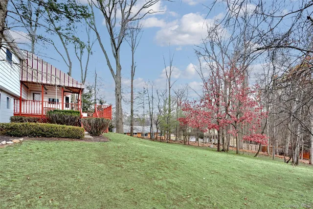 a backyard of a house with lots of green space