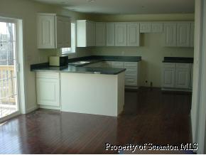 7 Pond Ridge Drive Scranton, PA 18504 - Photo 2 of 6 a kitchen with a sink and cabinets