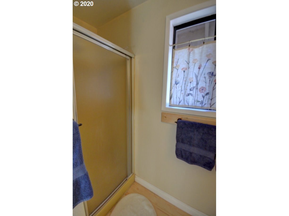 64980 East Pine Tree Way Rhododendron, OR 97049 - Photo 24 of 32 a picture of a bathroom with a sink