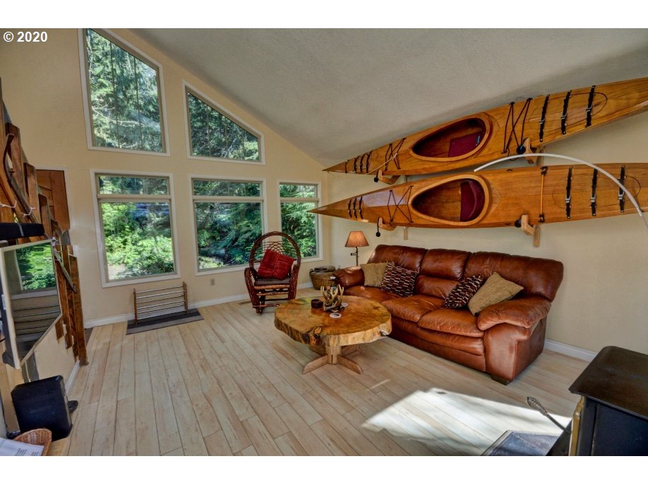 64980 East Pine Tree Way Rhododendron, OR 97049 - Photo 5 of 32 a living room with furniture and a window