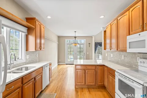 a large kitchen with a large window
