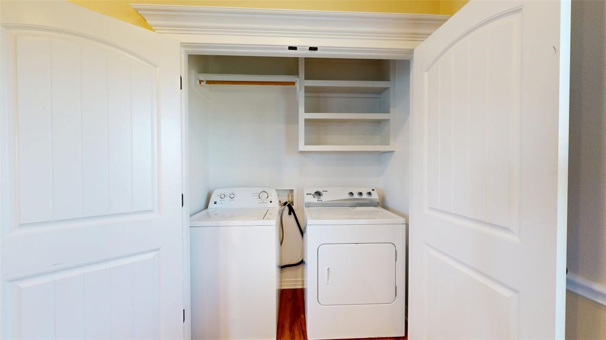 2900 Horseback Court College Station, TX 77845 - Photo 13 of 47 a utility room with dryer and washer