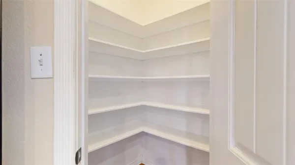 a kitchen with stainless steel appliances granite countertop a refrigerator stove and microwave