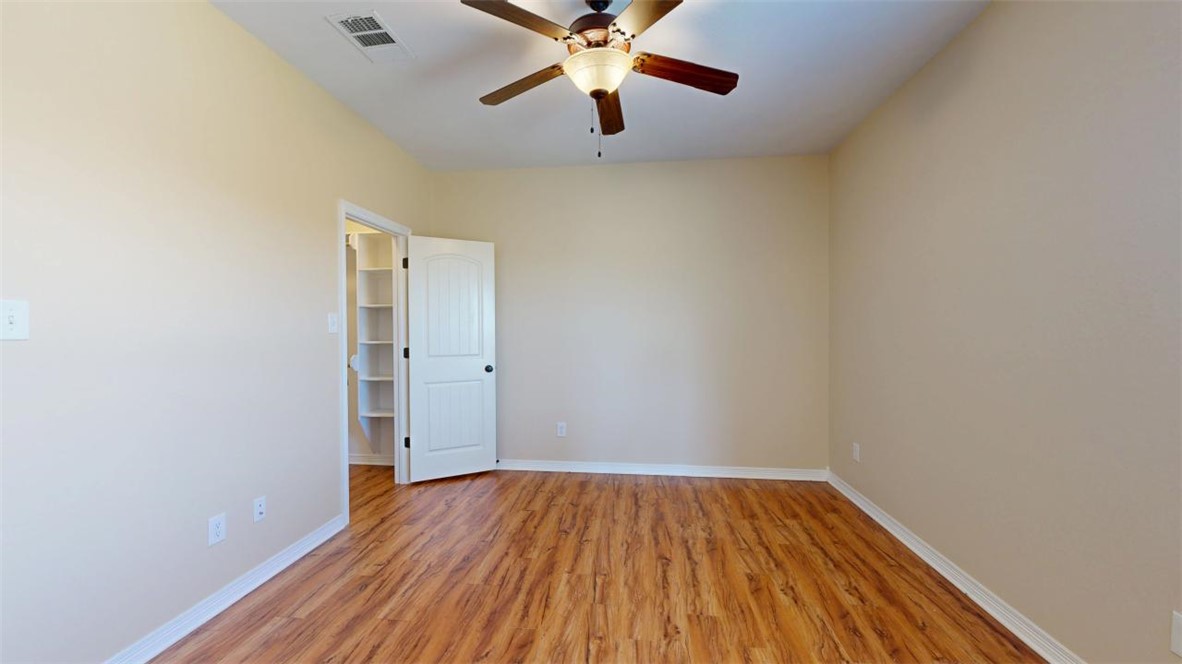 2900 Horseback Court College Station, TX 77845 - Photo 34 of 47 a view of empty room with wooden floor