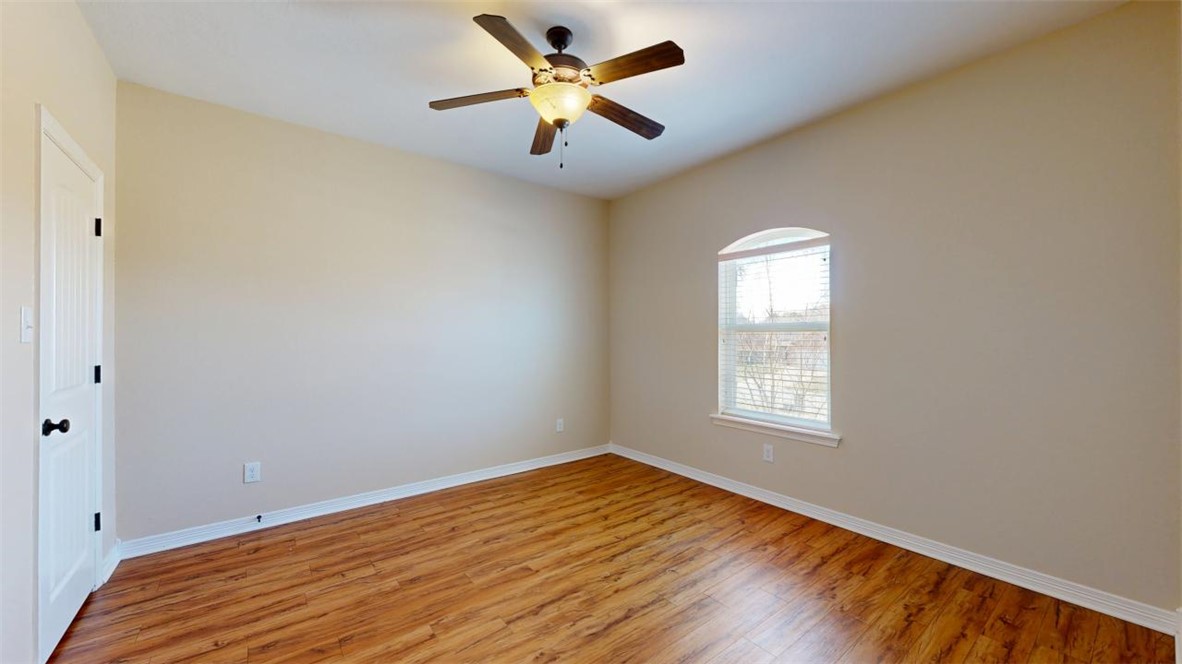 2900 Horseback Court College Station, TX 77845 - Photo 40 of 47 a view of empty room with wooden floor and fan
