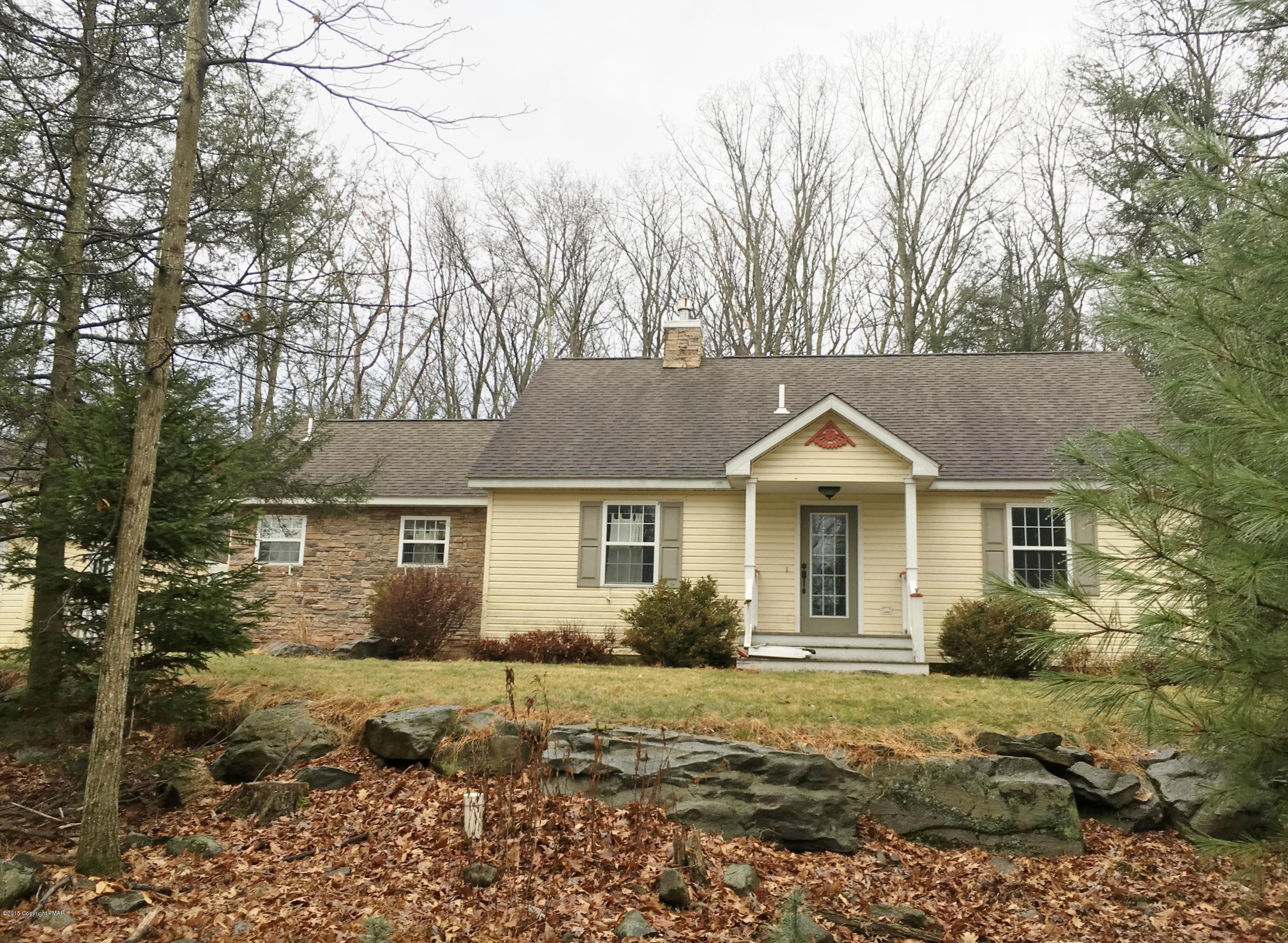 front view of house with a yard