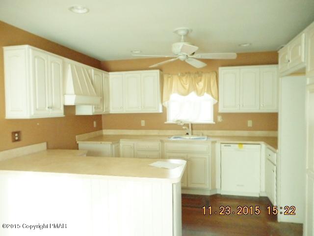341 Ridge Circle Cresco, PA 18326 - Photo 14 of 24 a bathroom with a tub sink and a mirror