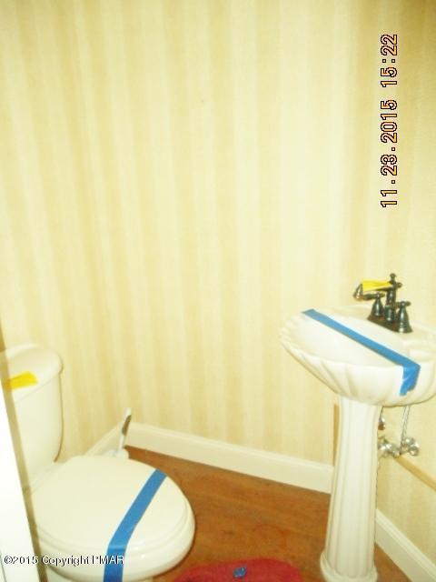 341 Ridge Circle Cresco, PA 18326 - Photo 19 of 24 a bathroom with a sink and a mirror