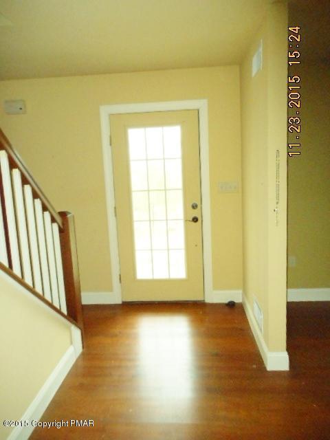 341 Ridge Circle Cresco, PA 18326 - Photo 8 of 24 a view of a room with wooden floor and a window