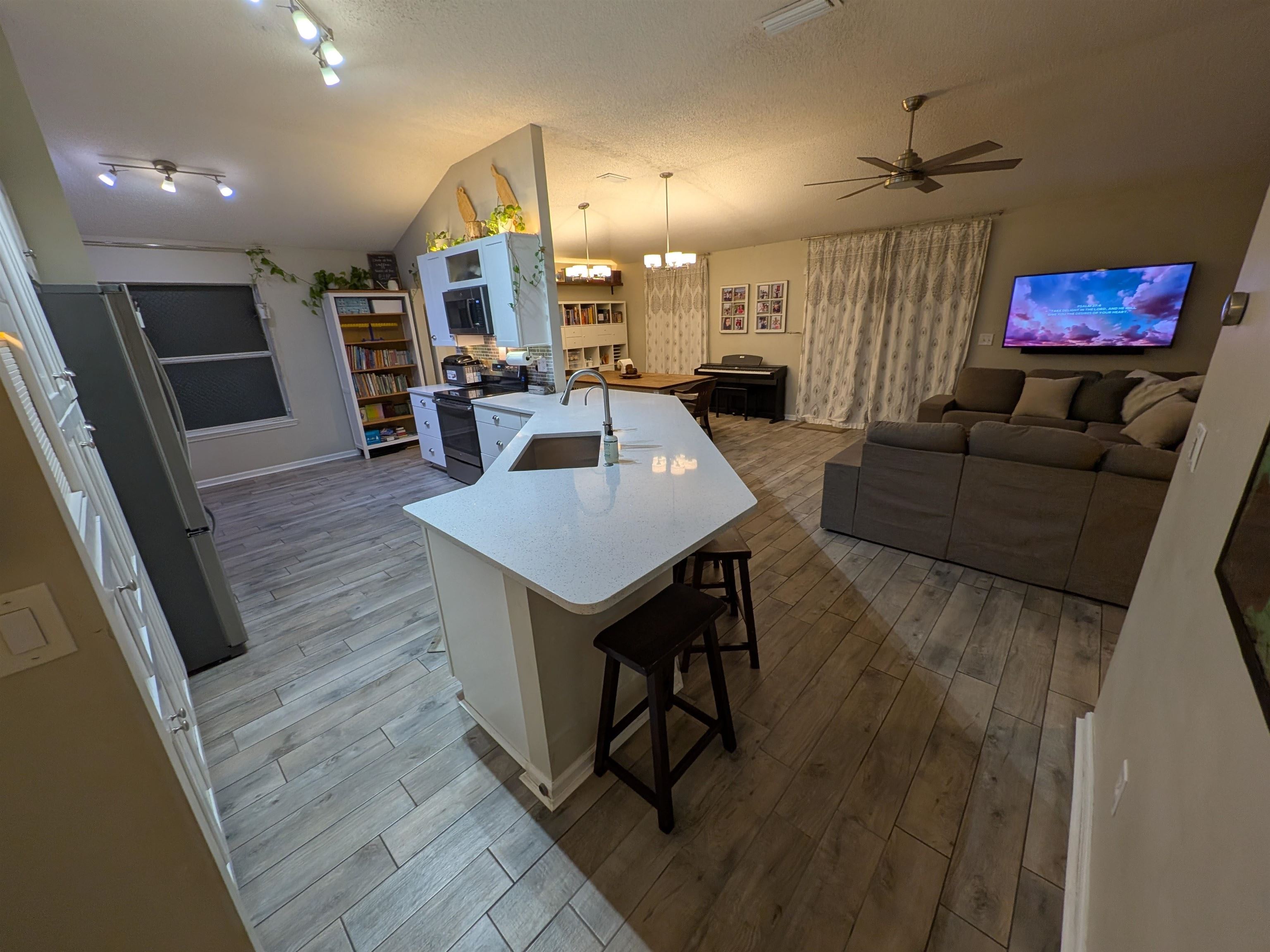 921 Oak Arbor Circle St. Augustine, FL 32084 - Photo 11 of 51 a living room with furniture and a wooden floor