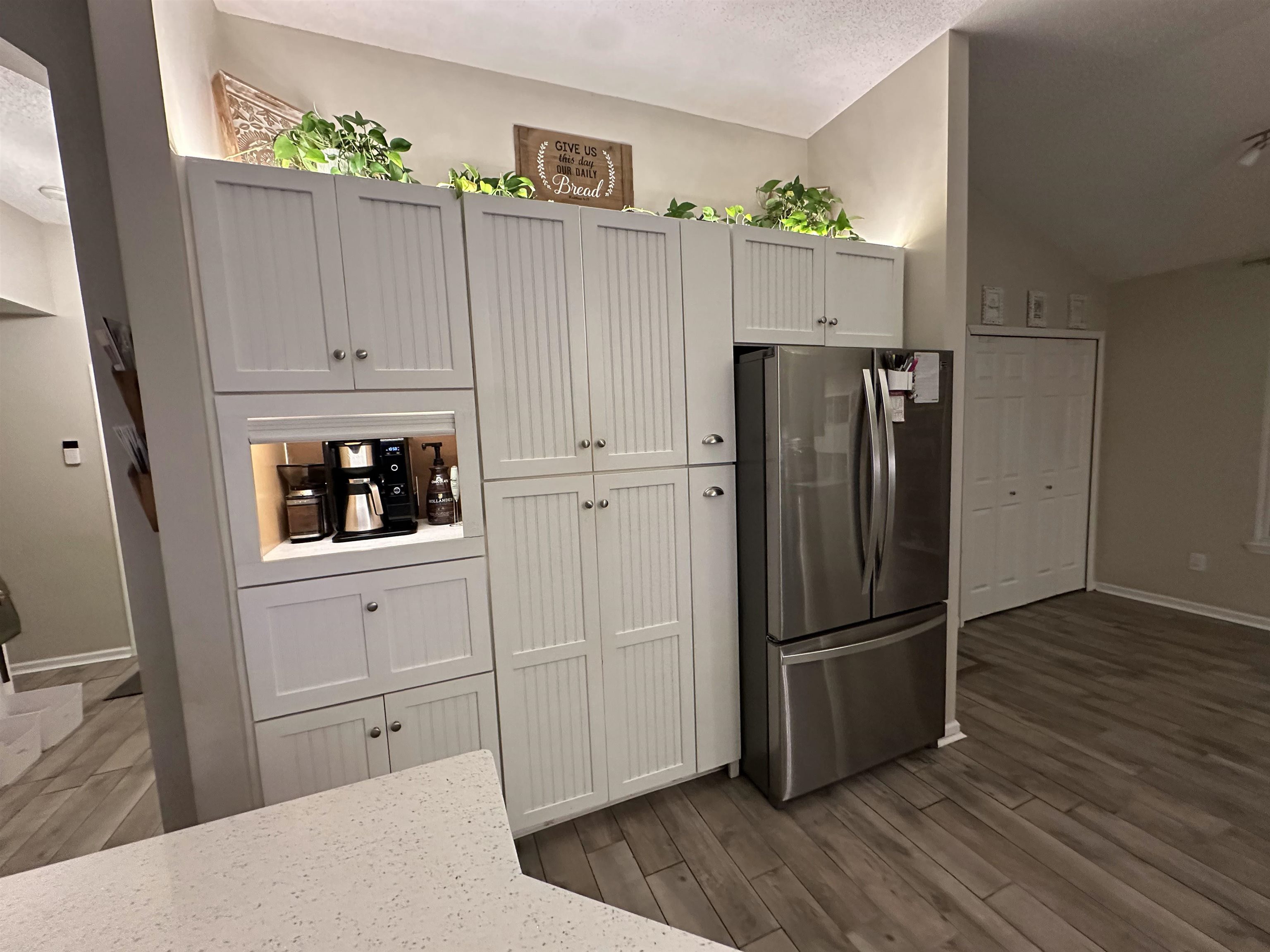 921 Oak Arbor Circle St. Augustine, FL 32084 - Photo 16 of 51 a kitchen with cabinets and stainless steel appliances