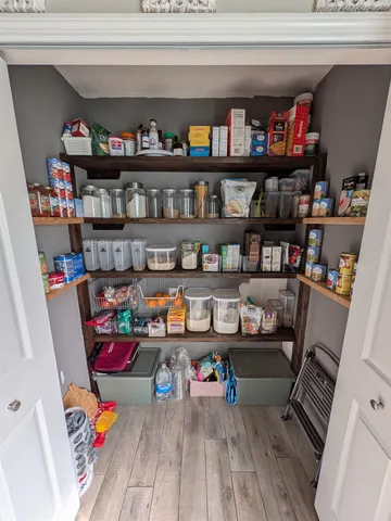 a room with furniture and a book shelf