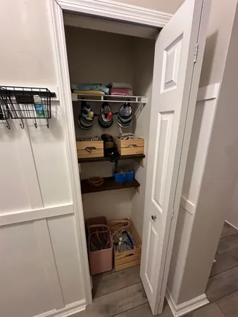 a balcony with table and chairs