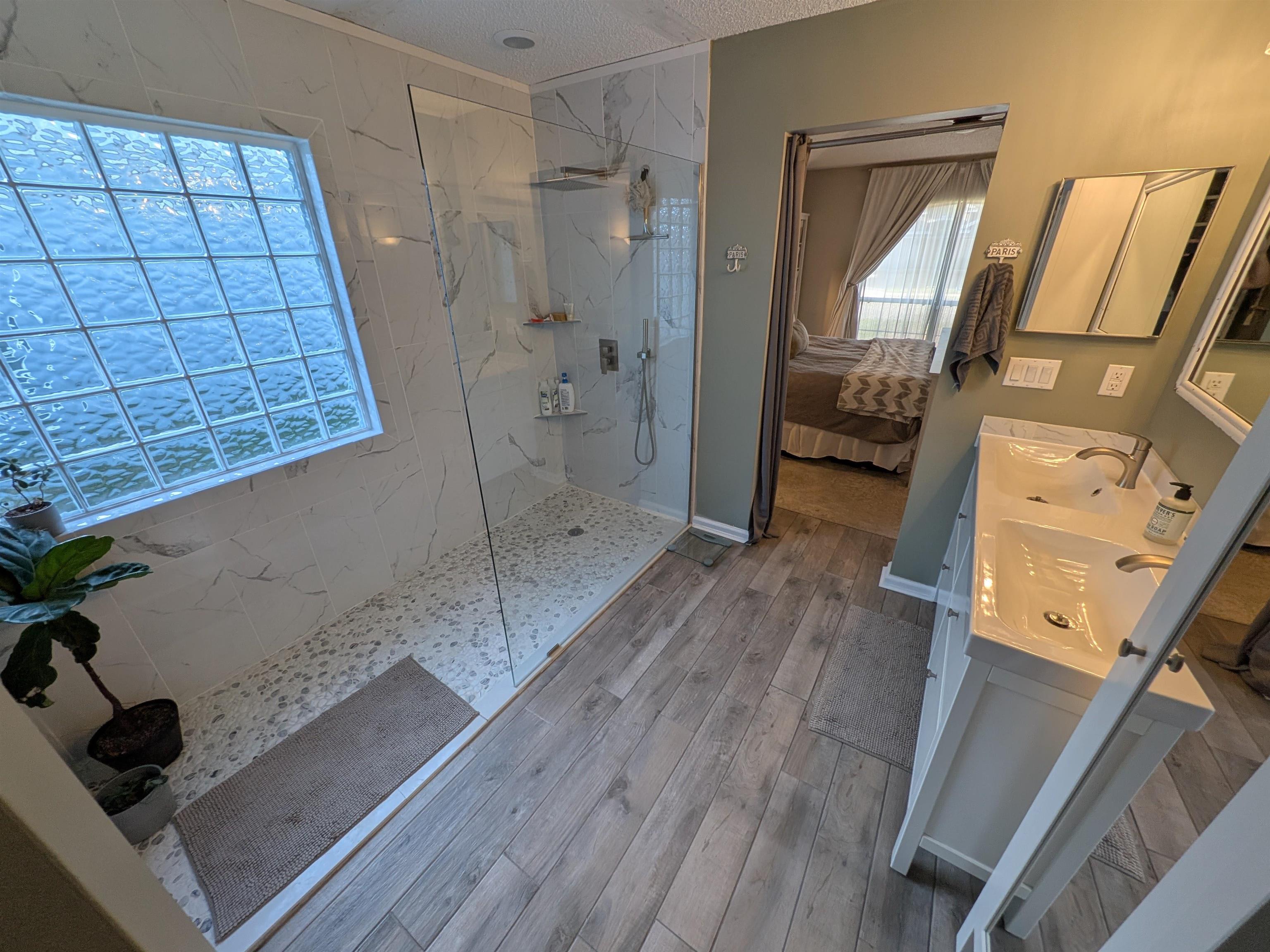 921 Oak Arbor Circle St. Augustine, FL 32084 - Photo 29 of 51 a bathroom with a sink and a mirror