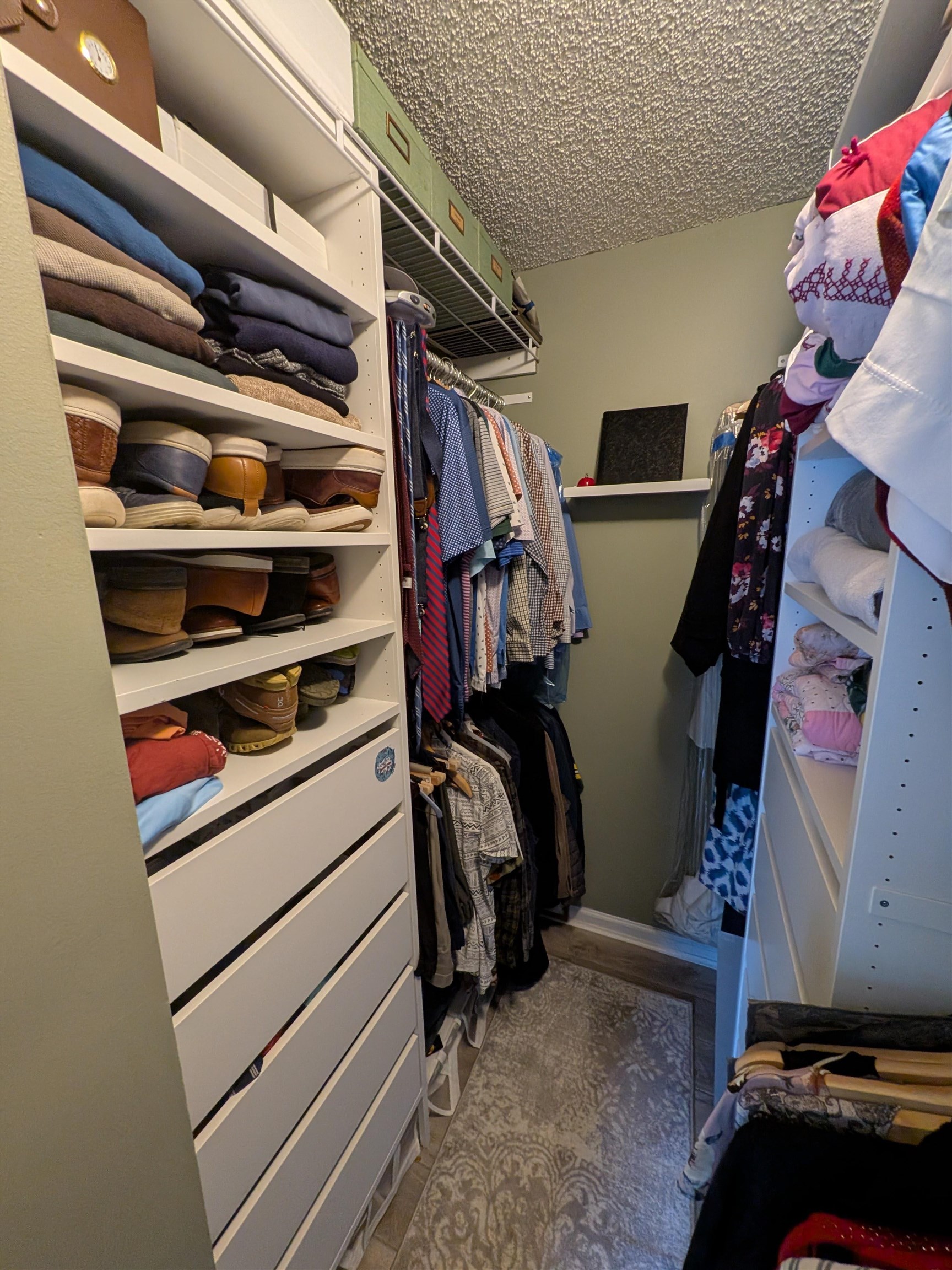 921 Oak Arbor Circle St. Augustine, FL 32084 - Photo 34 of 51 a view of walk in closet with clothes and shoes