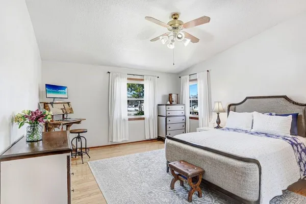 a front view of a house with outdoor seating