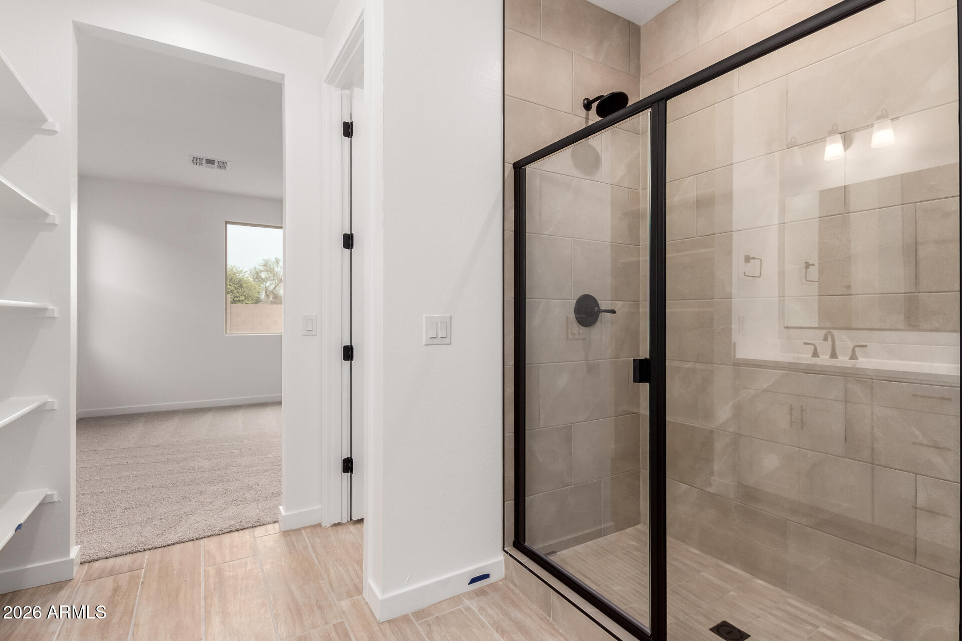 8026 West Granada Road Phoenix, AZ 85035 - Photo 10 of 31 a bathroom with a shower and a mirror